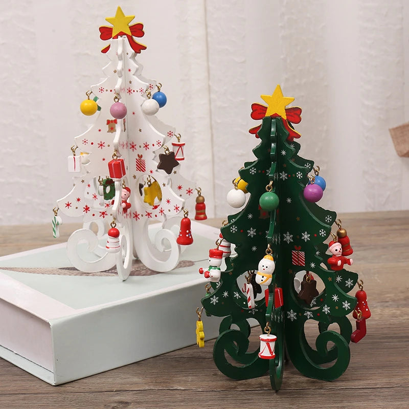 Two decorative wooden Christmas tree ornaments, one white and one green, with colourful hanging festive decorations.