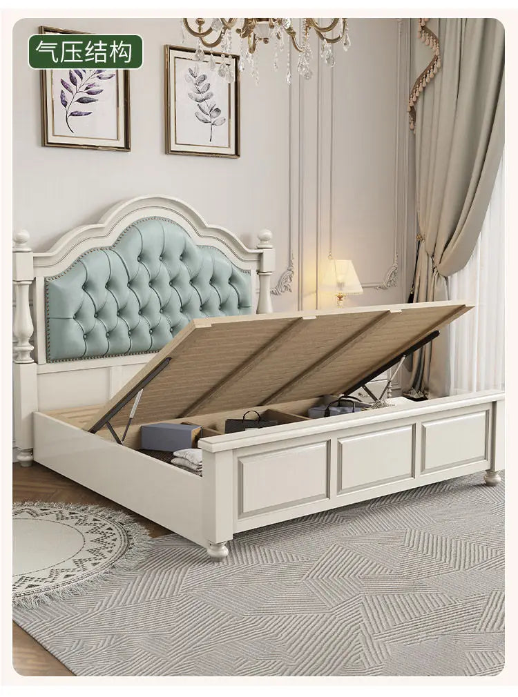 Cream-coloured wooden double bed with an arched, tufted sage green headboard and convenient gas-lift storage base.