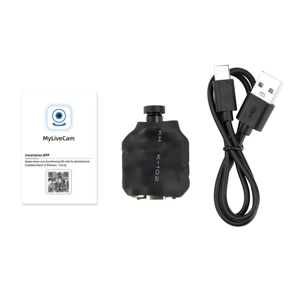 Black mini security camera with lens, a black USB charging cable, and a white paper installation manual.