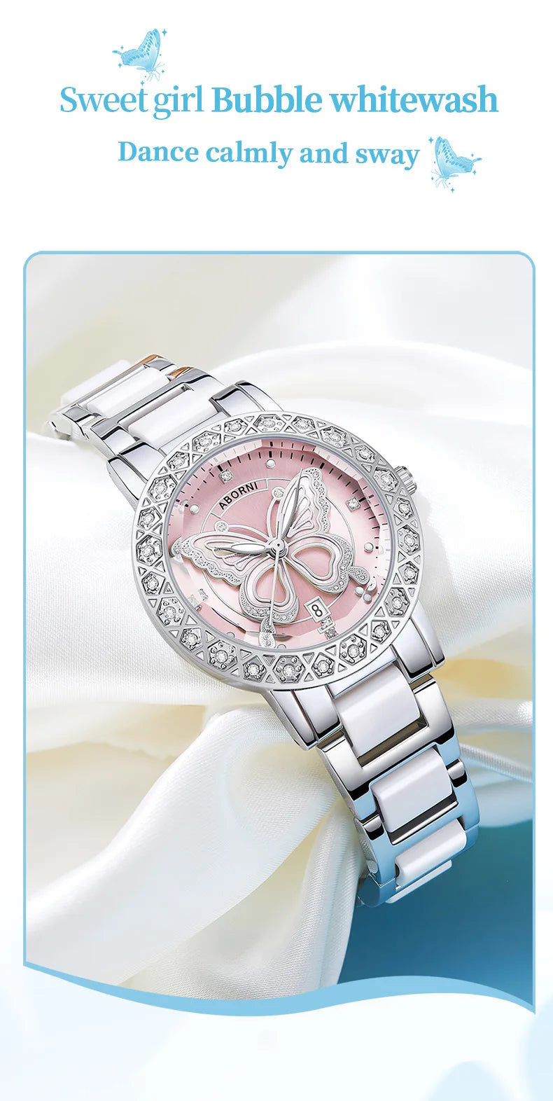 Luxury women's watch with a pink butterfly dial, crystal-studded bezel, and a white and silver stainless steel strap.