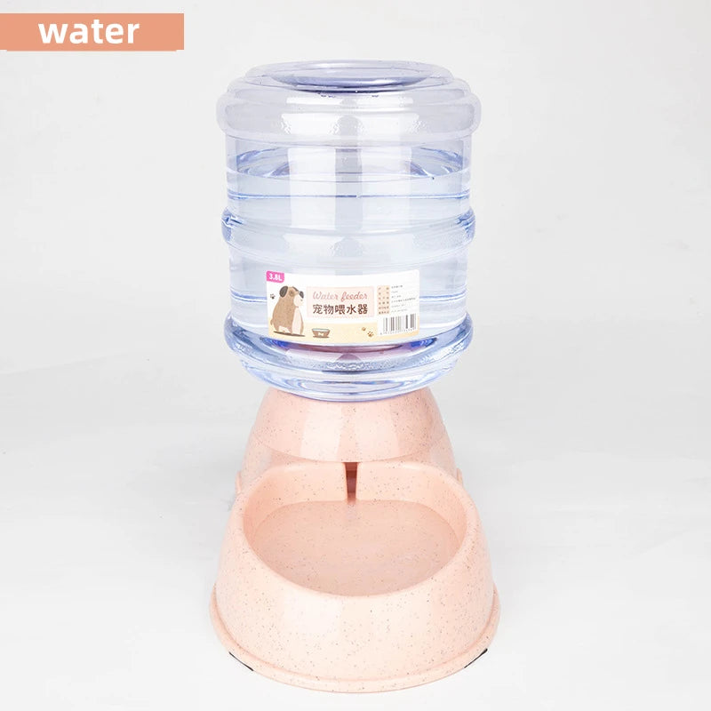 Automatic pet water dispenser with a clear 3.8L plastic reservoir on a speckled light pink base.
