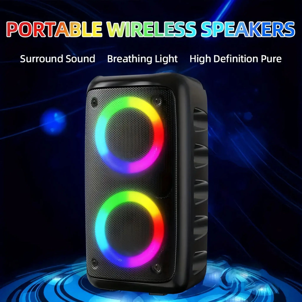 Portable black wireless speaker with dual circular LED lights that glow in vibrant rainbow colours.