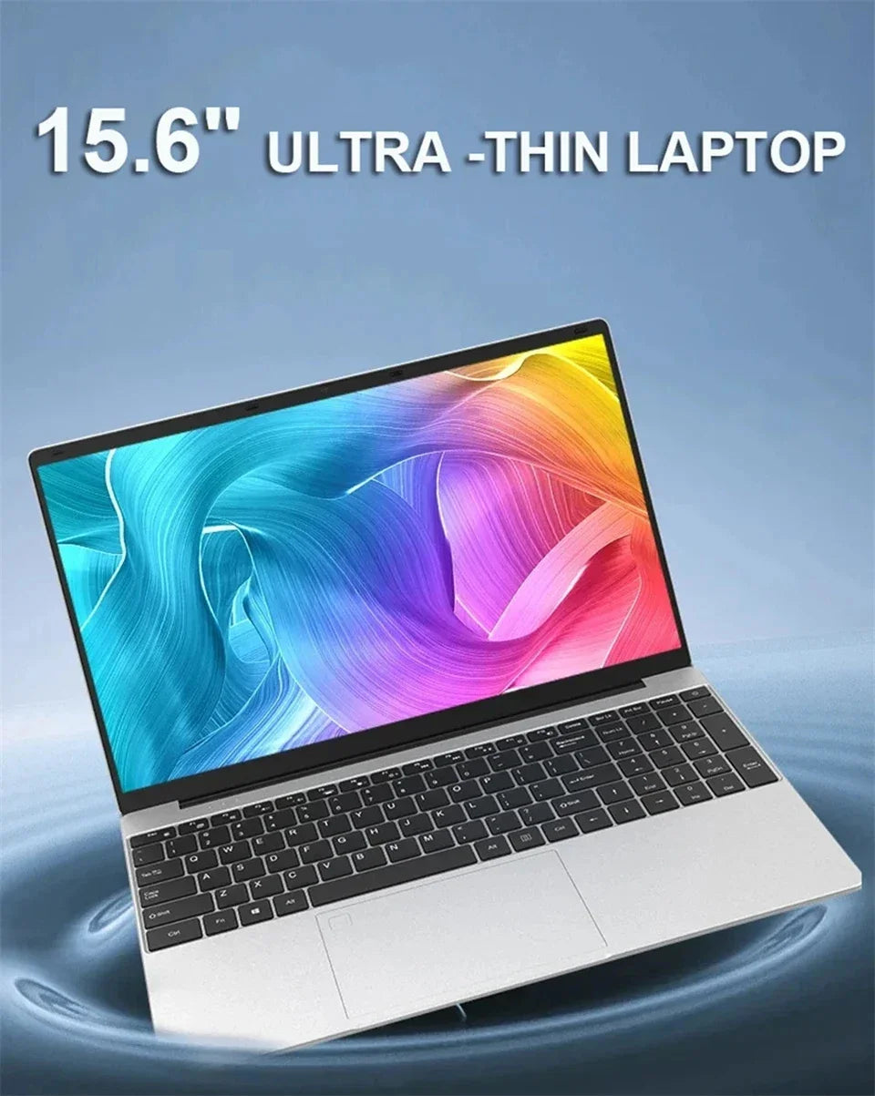 Ultra-thin 15.6-inch silver laptop with a full-size black keyboard and a vibrant, colourful abstract screen display.