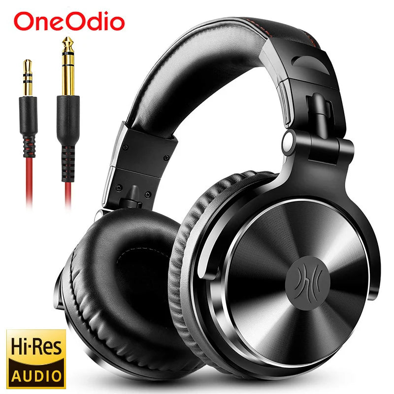 Black over-ear studio monitor headphones with a padded headband and two interchangeable audio cables.
