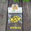Two yellow plastic hair clips in clear packaging with a cute bear-themed "Happy" header card.