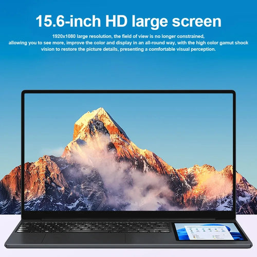 Sleek dark grey 15.6-inch dual-screen laptop featuring a secondary 7-inch touch display next to the keyboard.