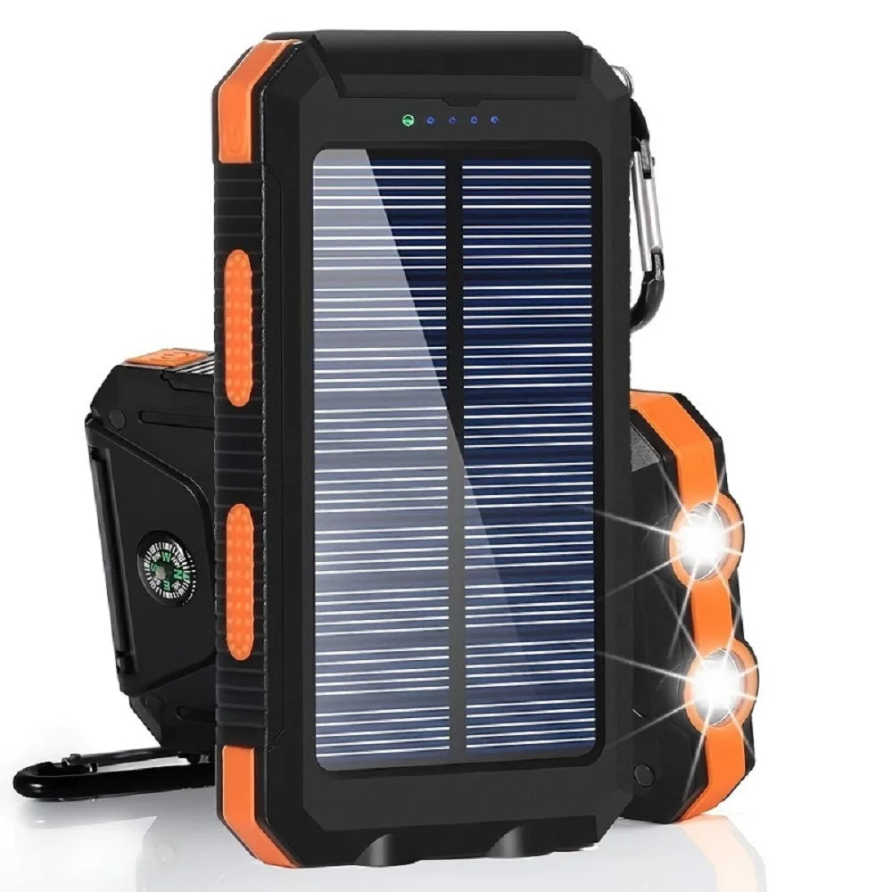 Rugged black and orange solar power bank with built-in LED torch, compass, and carabiner clip for outdoor use.