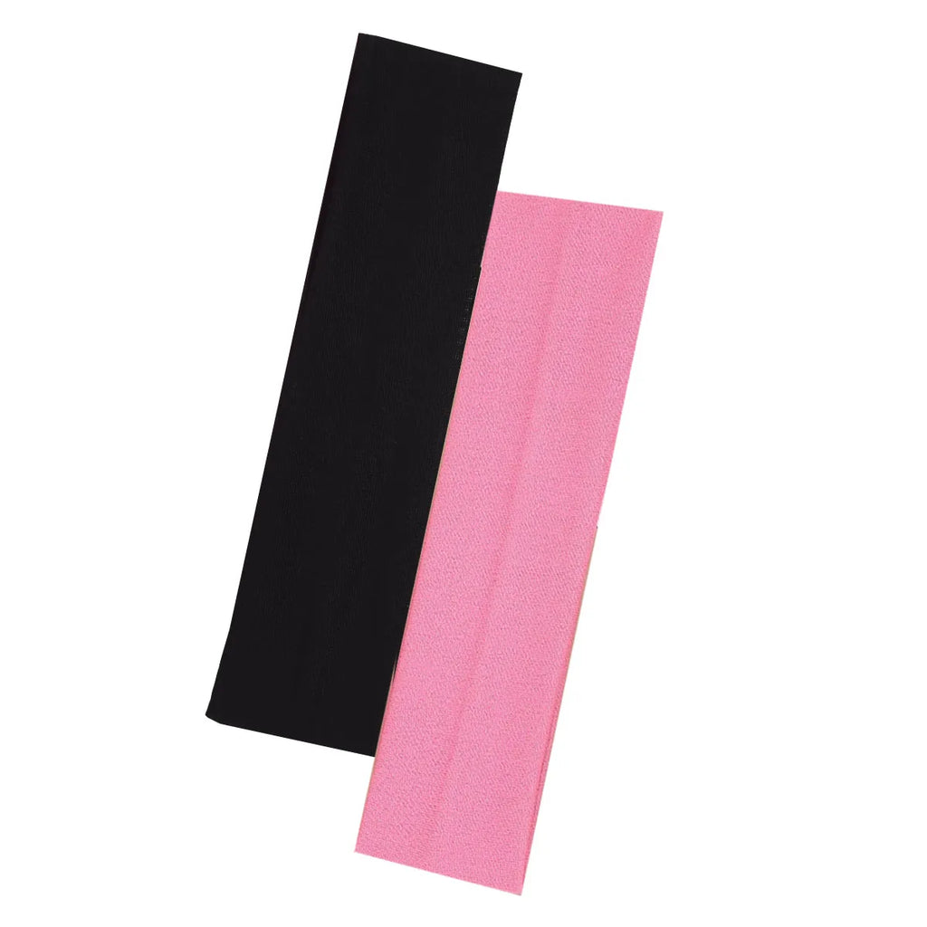 Two wide, fabric headbands in black and bright pink, laid flat against a white background.