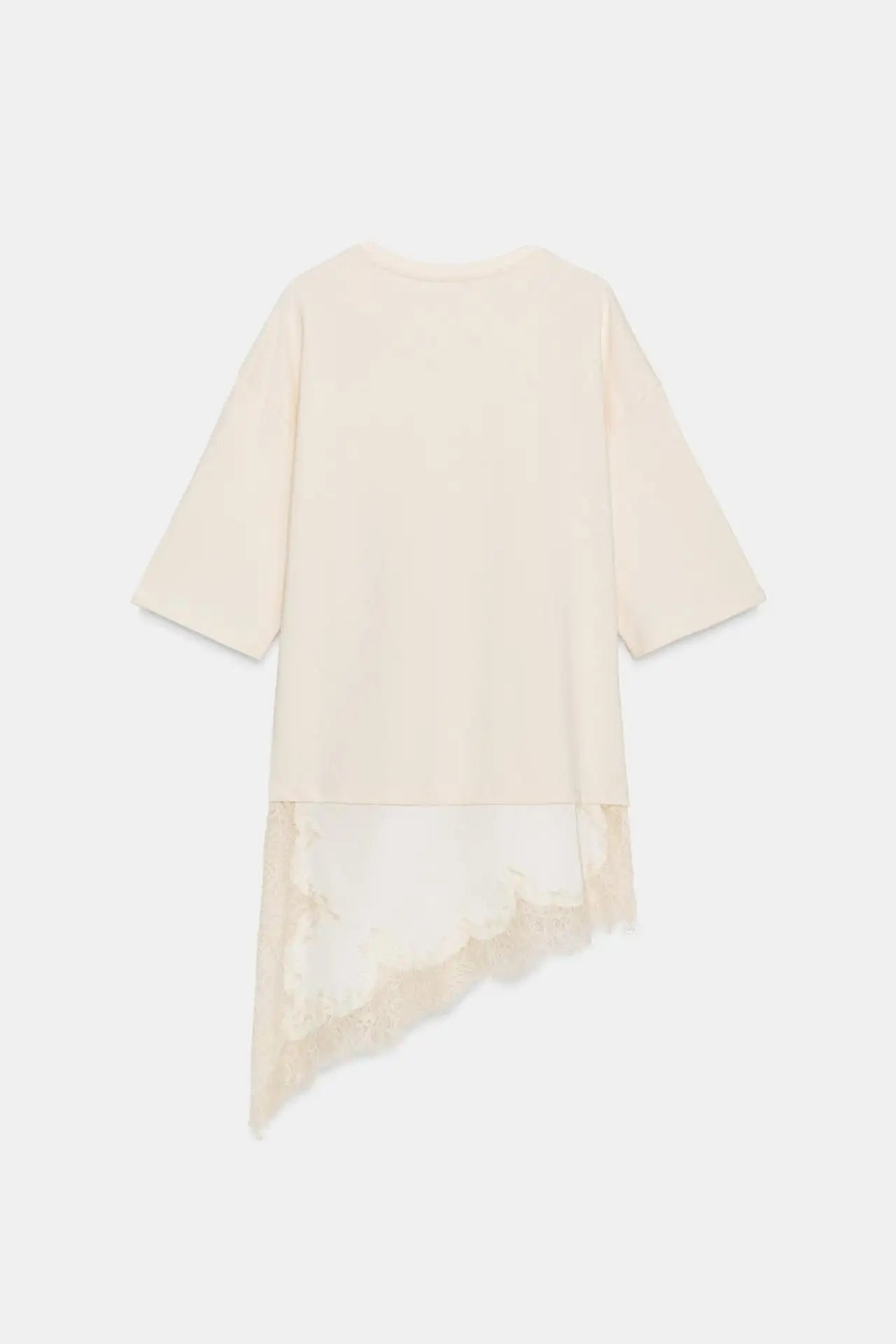 Cream short-sleeve T-shirt with an asymmetric hem and delicate lace trim detail.