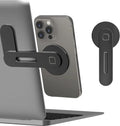 Black magnetic phone holder attached to a laptop, allowing the smartphone to mount securely to the screen side.