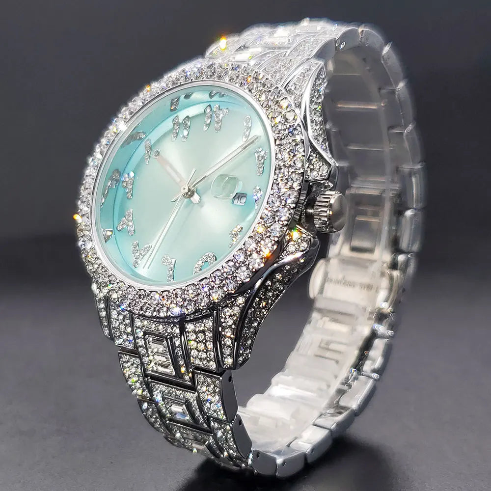 Women's silver-tone dress watch featuring a turquoise dial, crystal-encrusted bezel, and sparkling link bracelet.