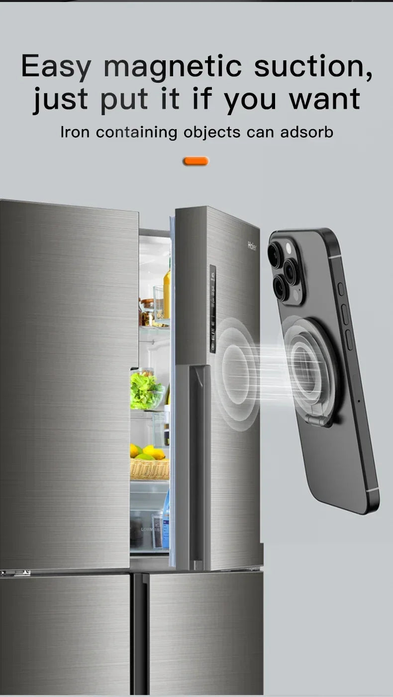 Circular magnetic phone mount attaching a smartphone to a grey stainless steel refrigerator door.