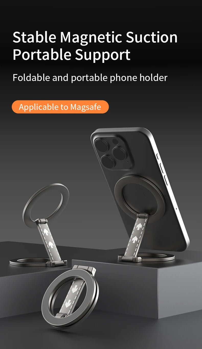 Foldable, dark grey circular magnetic phone stand with a hinged, extendable arm, shown attached to a smartphone.