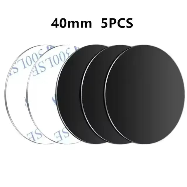 Five 40mm round, black adhesive discs with white peel-off backing, arranged in a layered row.