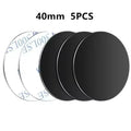 Five 40mm round, black adhesive discs with white peel-off backing, arranged in a layered row.