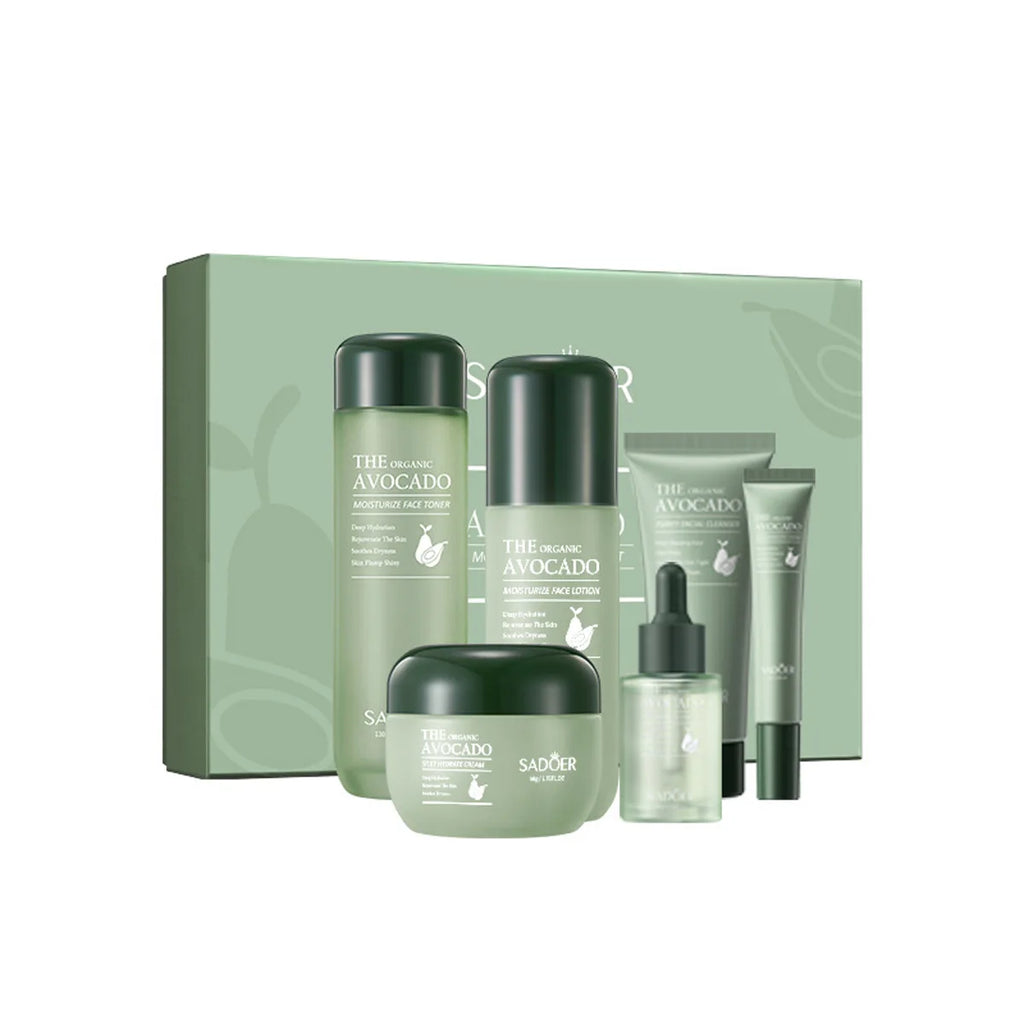 Five-piece avocado-themed skincare set in a sage green gift box, including toner, lotion, cream, serum, and eye cream.