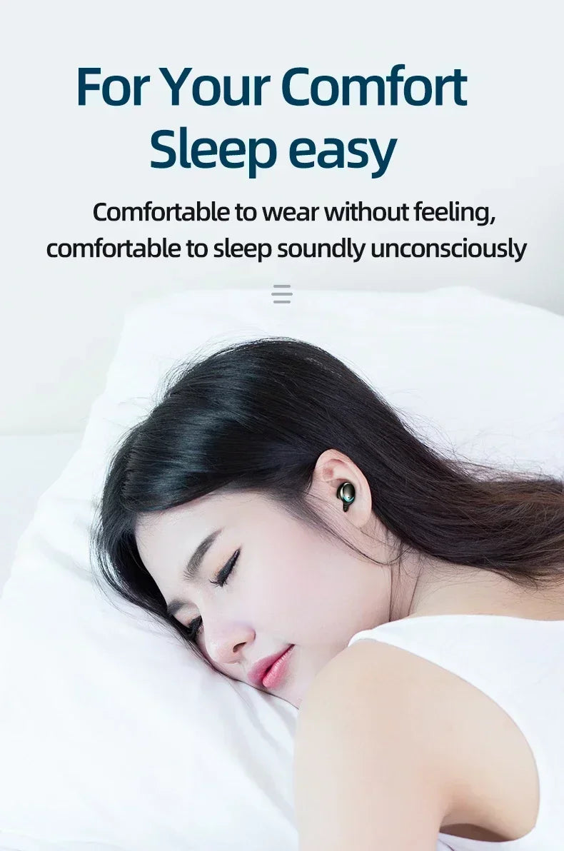 A woman sleeps on a white pillow wearing small, discreet black wireless sleep earbuds.