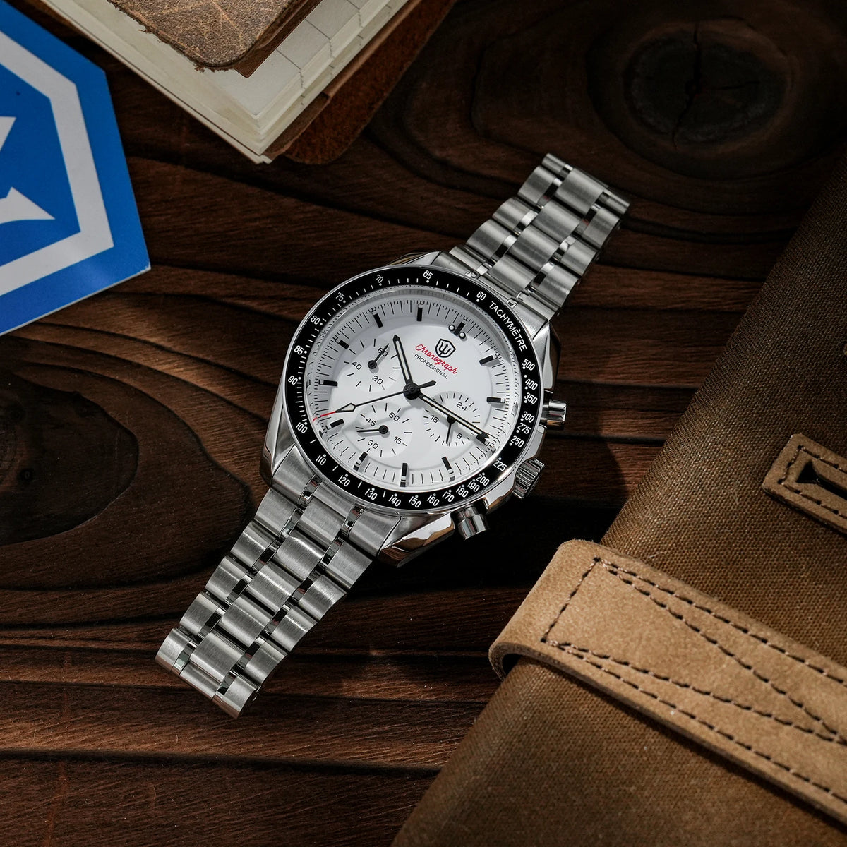 Watchdives WD1860 stainless steel chronograph watch with a round white dial, black bezel, and link bracelet.