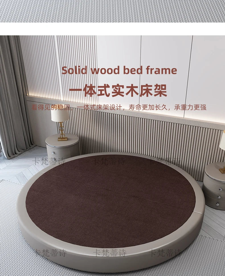 Modern minimalist circular double bed frame in a neutral beige finish with a dark brown upholstered centre panel.