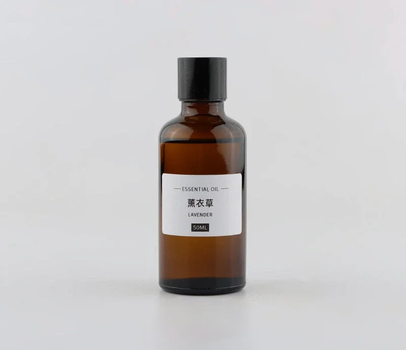 50ml amber glass bottle of lavender essential oil with a black screw cap and simple white label.