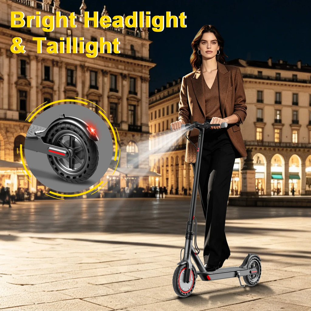 Black foldable adult electric scooter with bright headlight, taillight, and red wheel accents in a city.