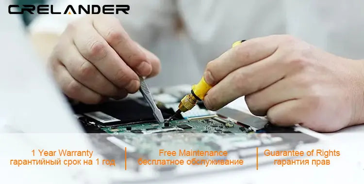 Technician using professional tools to repair the internal circuitry of a silver 15.6-inch dual-screen laptop.