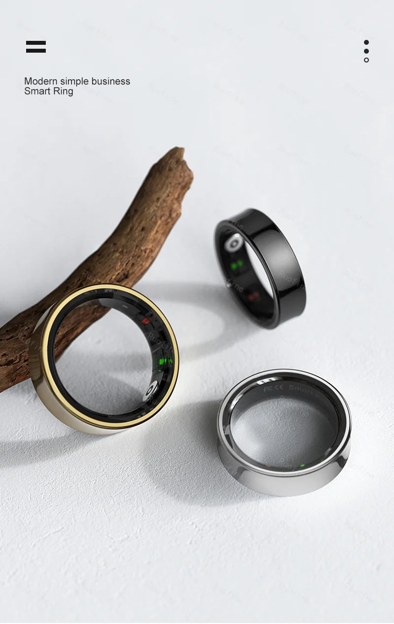 Three sleek smart health rings in gold, black, and silver finishes, displaying internal activity tracking sensors.