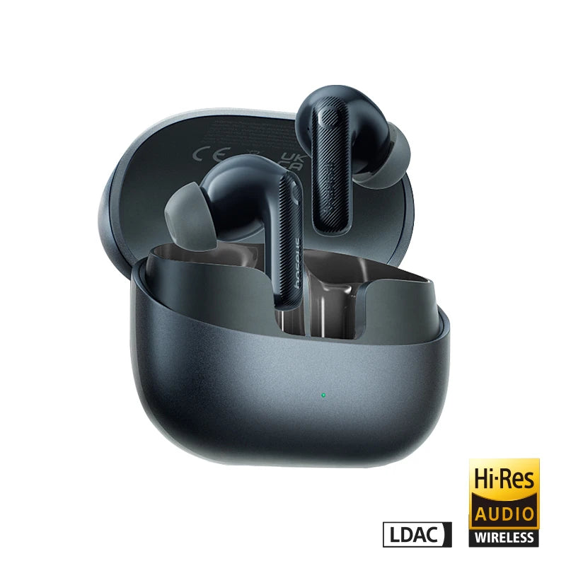 Dark blue wireless earbuds with in-ear tips in a matching open charging case against a white background.