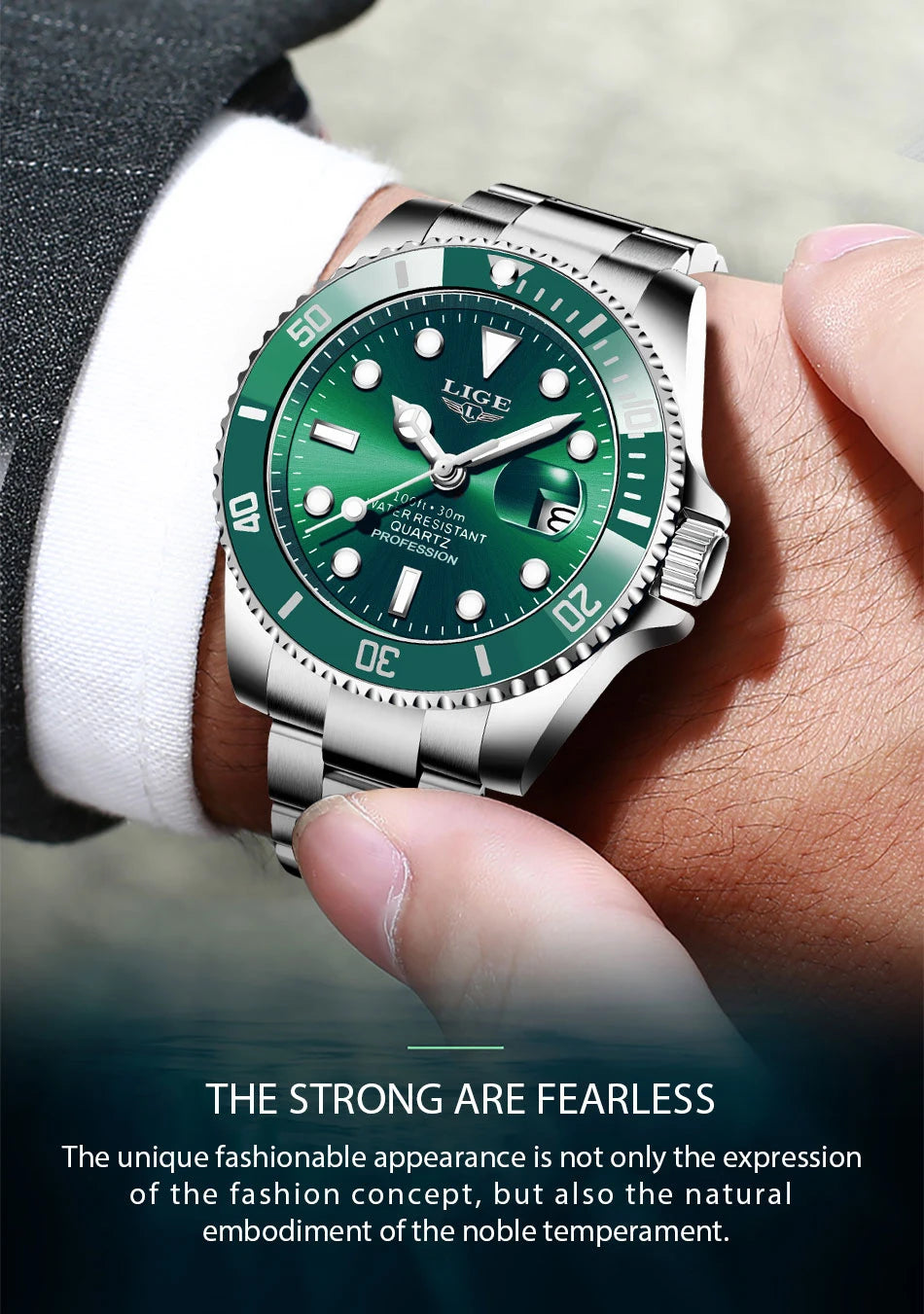 Men's stainless steel quartz watch with a green dial, green bezel, and metallic bracelet strap on a wrist.