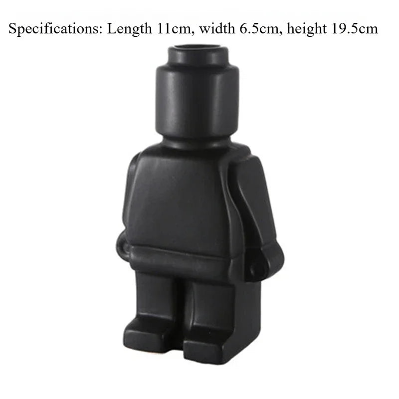 Matte black figure-shaped ceramic vase, 19.5cm tall, with a playful block-character design.