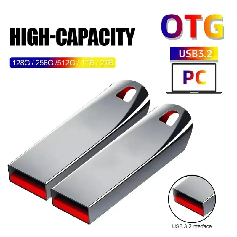 Two sleek, silver metallic USB flash drives with red accents and a keyring loop, featuring high-speed USB 3.2 connectors.