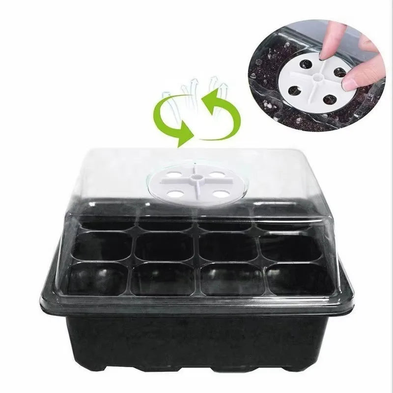 12-cell black plastic seedling tray with a clear dome lid and an adjustable circular white ventilation knob on top.