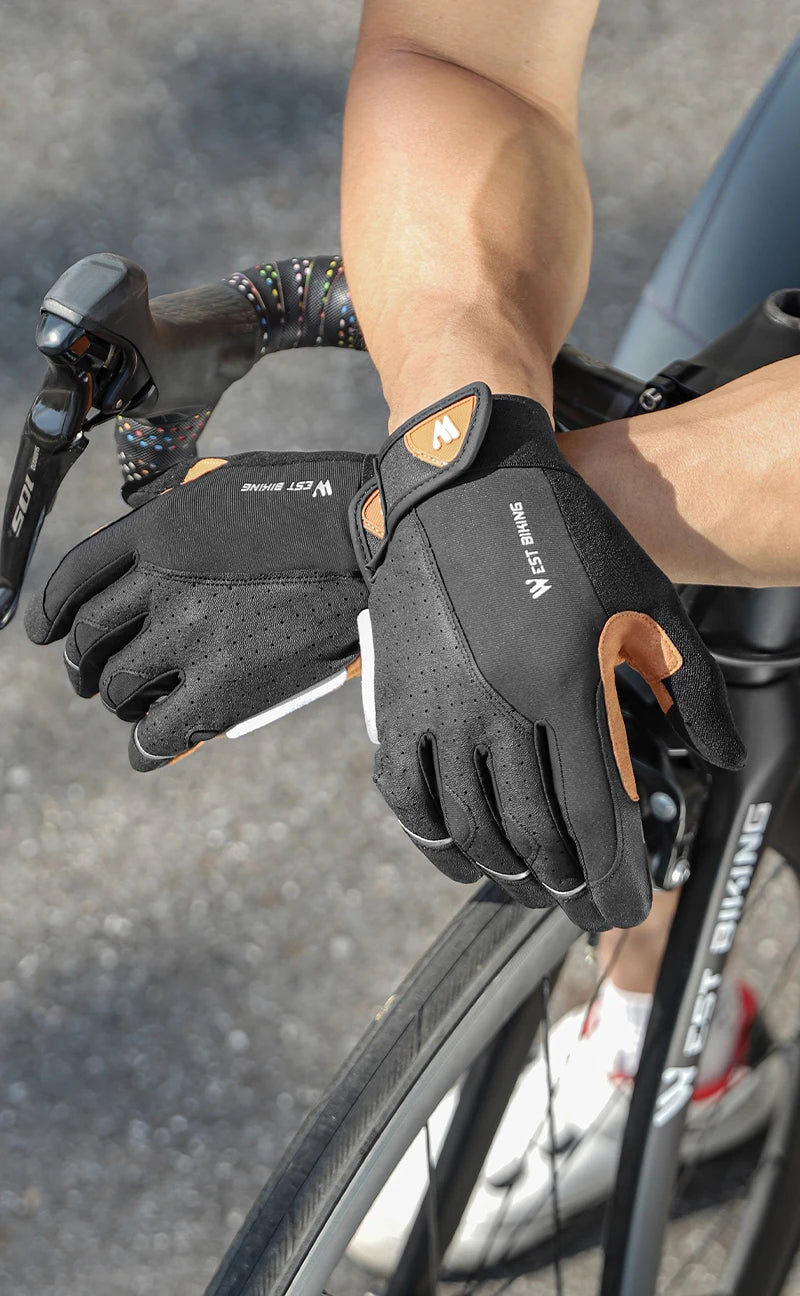 Black and tan West Biking cycling gloves with perforated fabric and adjustable hook-and-loop wrist straps.