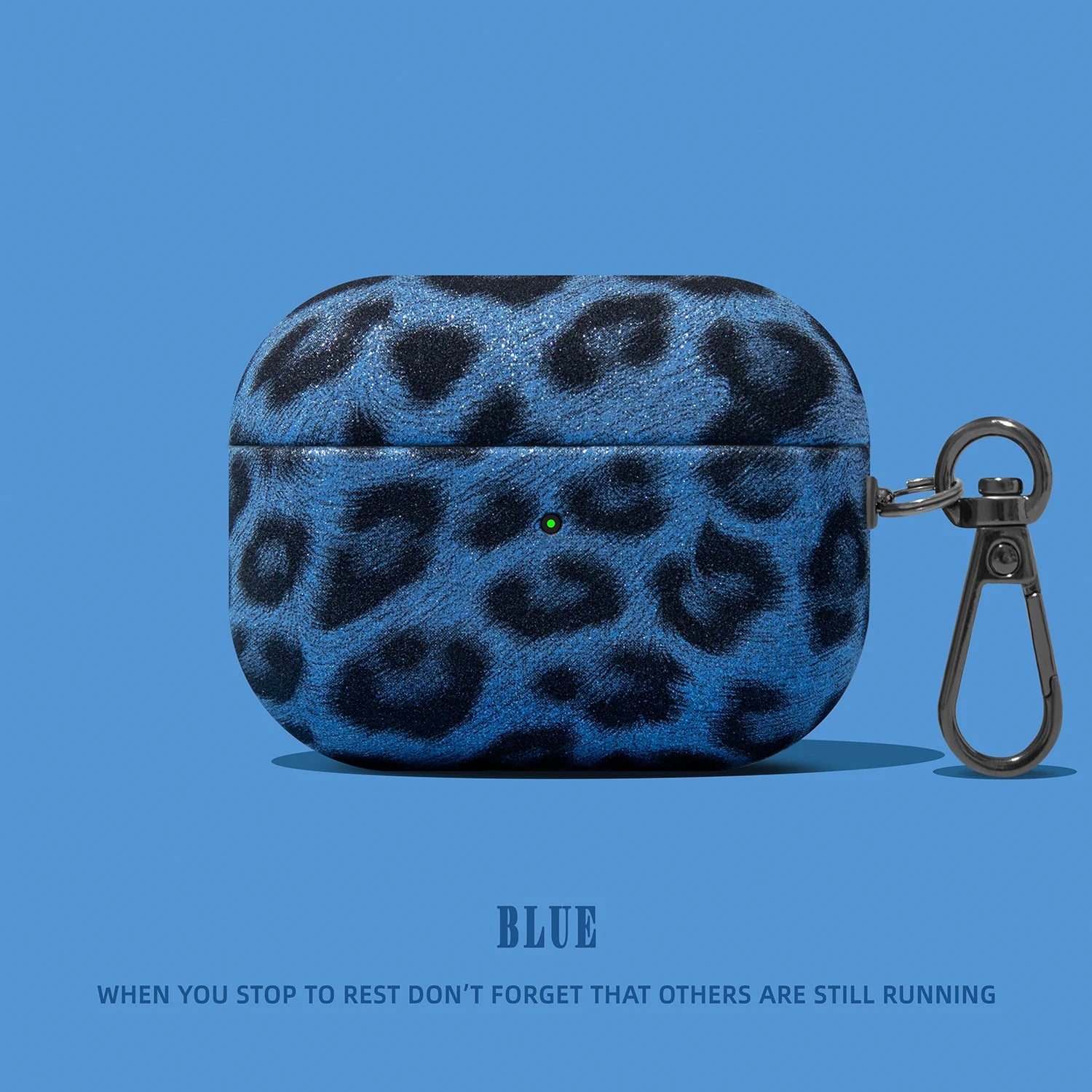 Blue leopard print textured AirPod Pro case with black metal carabiner clip.