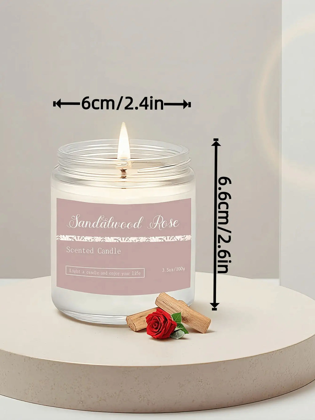 Sandalwood Rose scented candle in a glass jar, measuring 6cm wide by 6.6cm high, with a pink label.