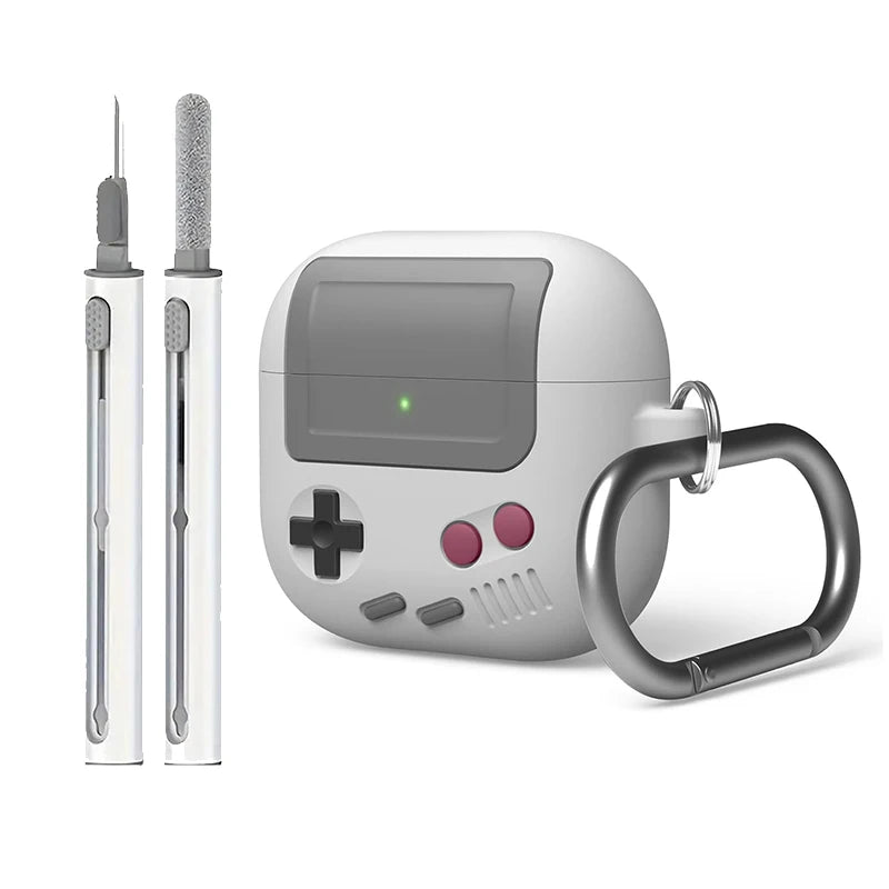 Retro gaming-style silicone AirPod case in grey and white, includes cleaning tool and carabiner.