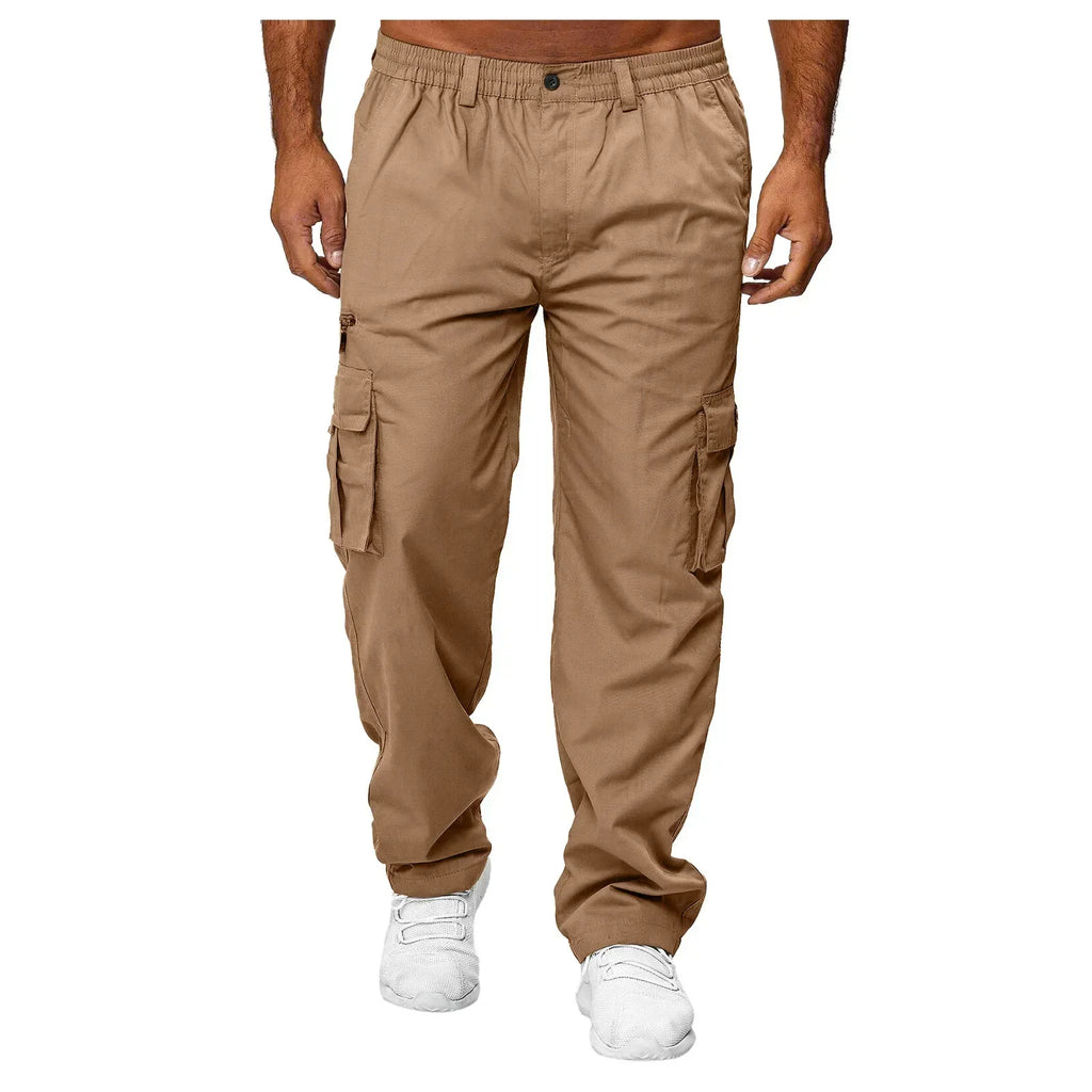 Men's tan casual workwear trousers with an elasticated waistband and large side cargo pockets.