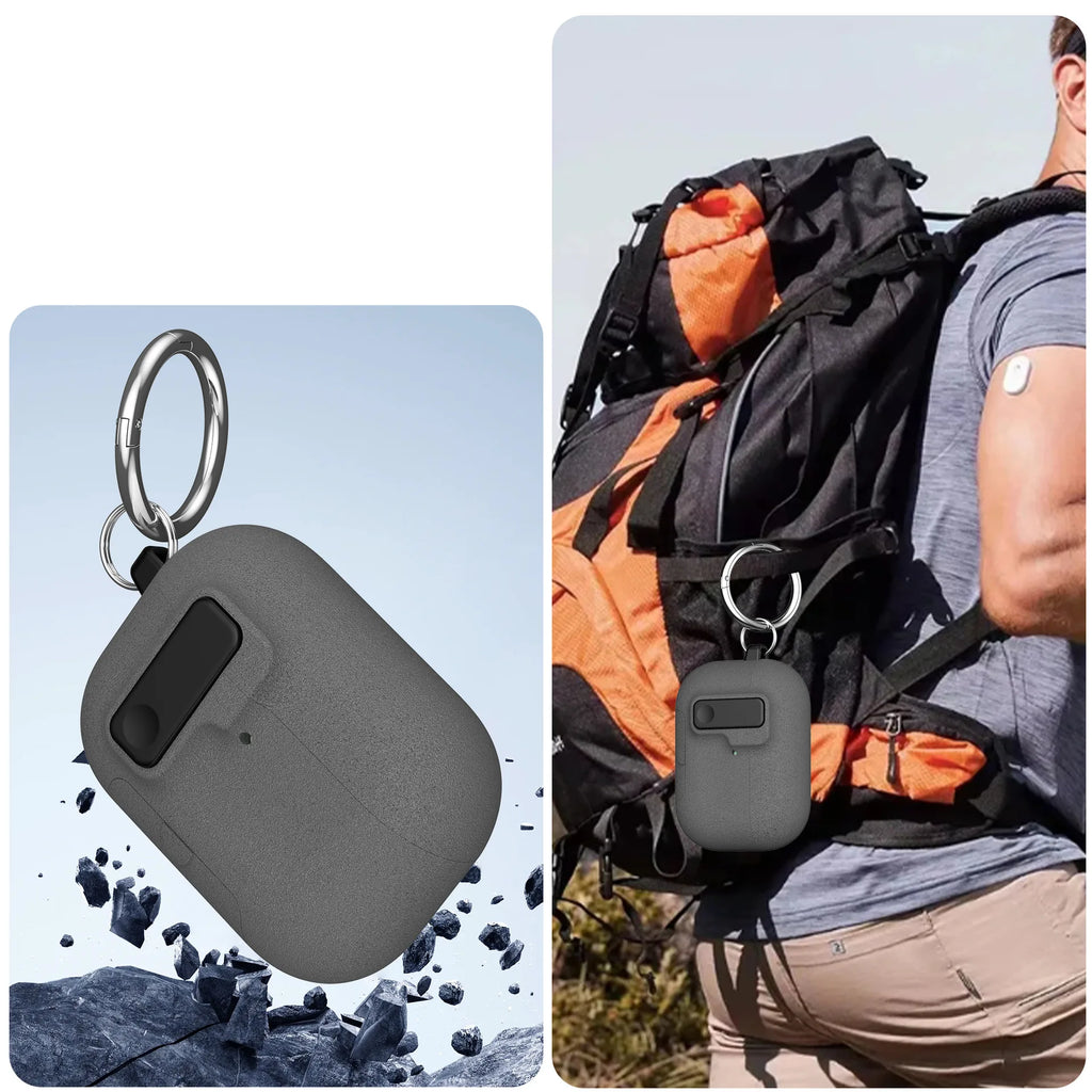 Grey protective silicone case for AirPods with carabiner clip, attached to a backpack.