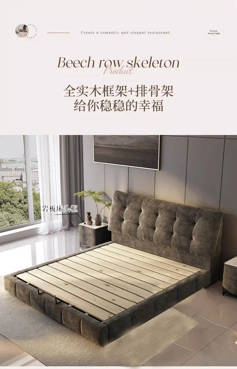 A modern grey, button-tufted upholstered bed frame with a natural wooden slat base in a bright, minimalist bedroom.