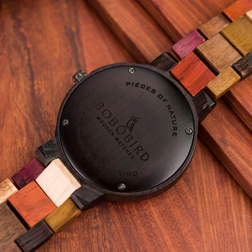 BOBO BIRD wooden watch showing the back case with engraved logo and a multicolored wooden link bracelet.