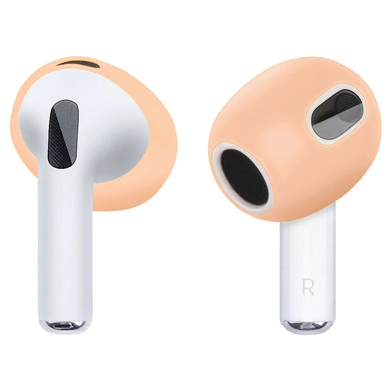 Peach silicone protective covers for Apple AirPods 3, featuring a soft-touch finish and precise fit.