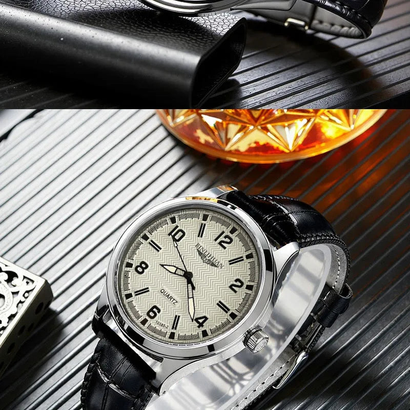 Men’s classic quartz watch with a textured cream dial, black hands and a black leather strap on a ribbed background.