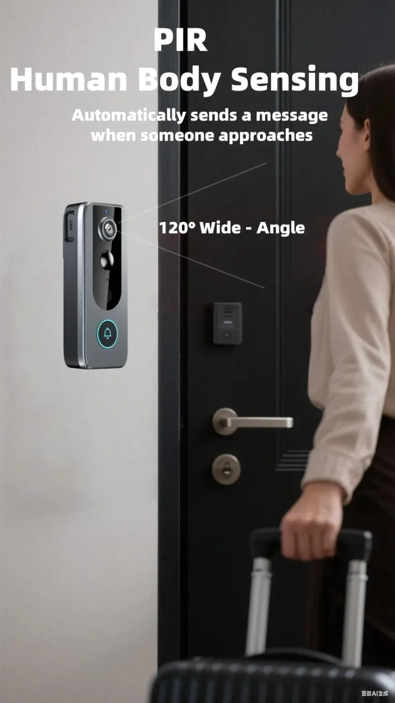 A slim, dark grey wireless video doorbell with a wide-angle camera lens and LED doorbell button mounted on a wall.
