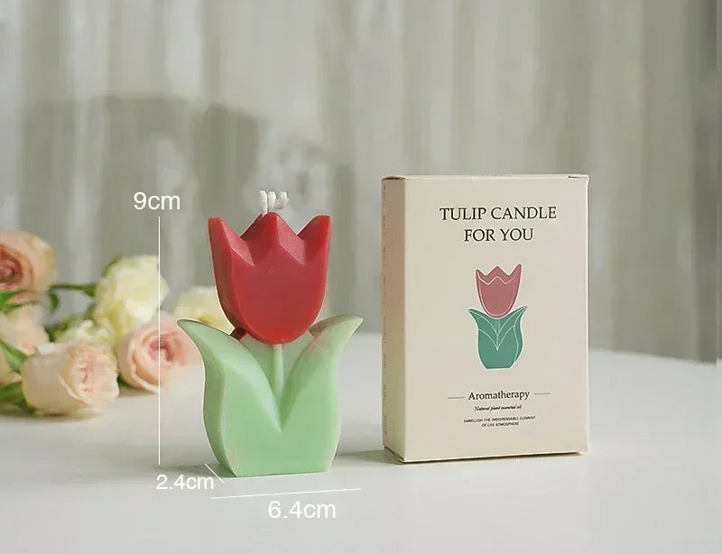 Red tulip-shaped aromatherapy candle with green leaves and matching gift box, 9cm tall.