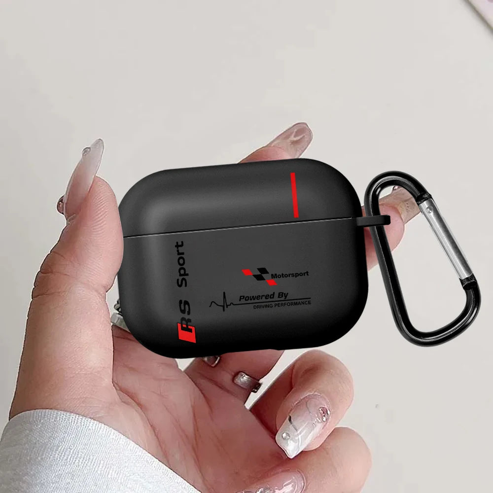 Black matte silicone AirPods Pro case with Audi RS Sport motorsport branding and an attached black metal carabiner.