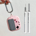 Pink retro game controller silicone case for AirPods with carabiner and cleaning kit.