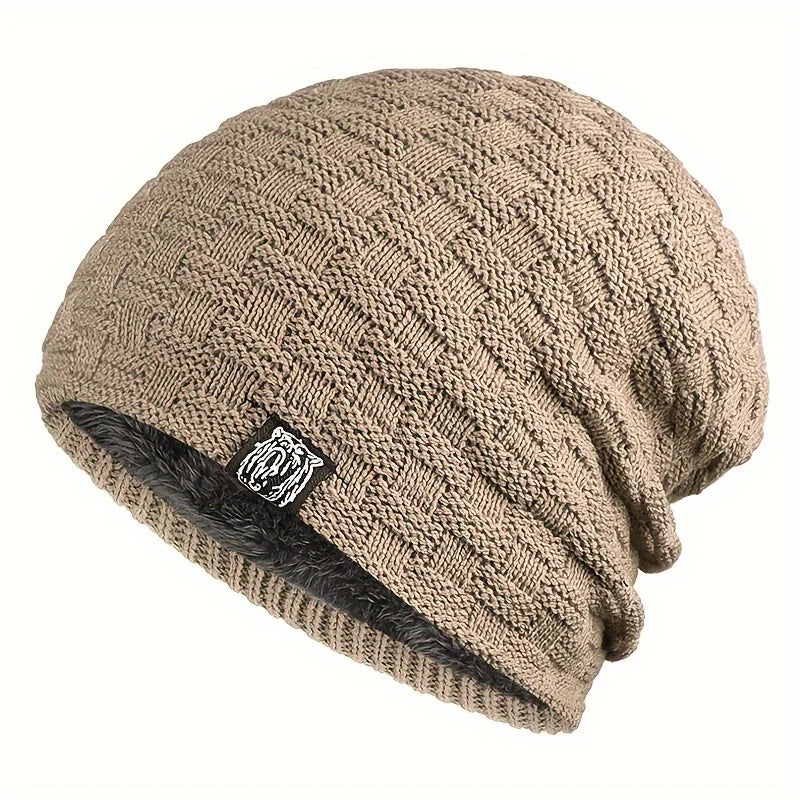 Beige men’s knitted beanie with a textured basket-weave pattern and soft, dark faux-fur lining.