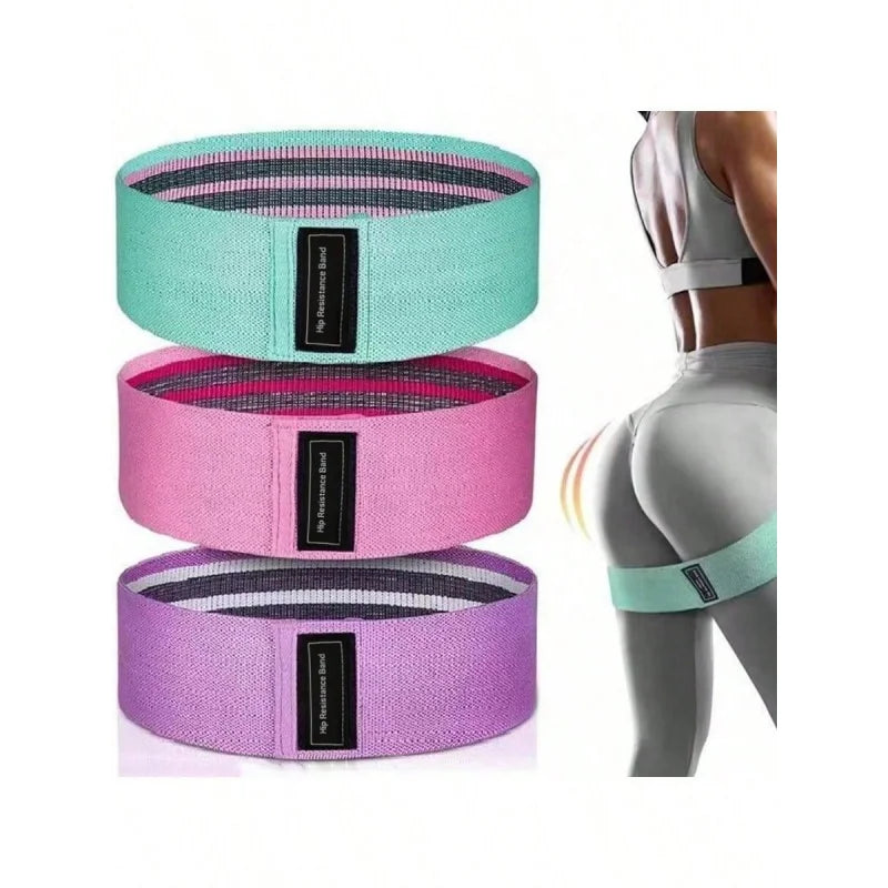 Set of three fabric hip resistance bands in mint, pink, and purple, shown worn by a person in gym wear.