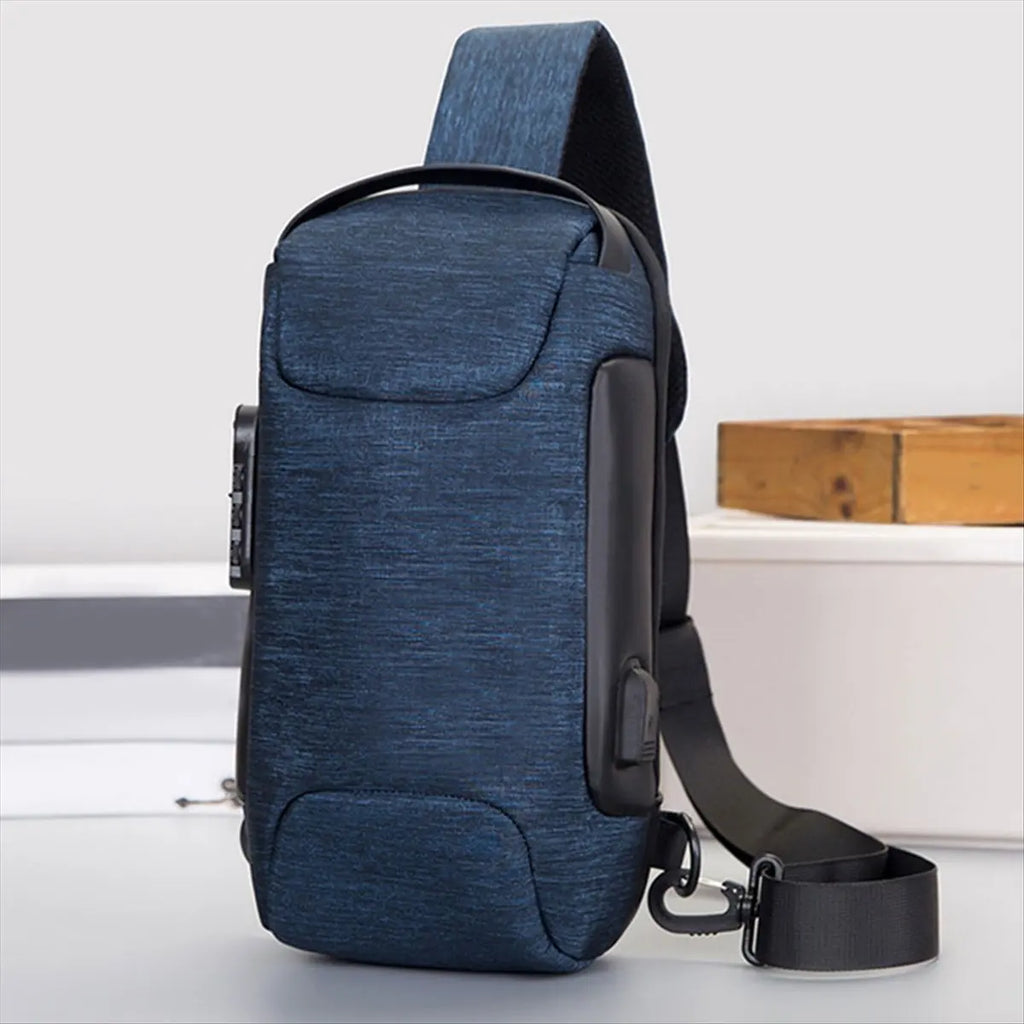 Navy blue waterproof crossbody sling bag with an integrated USB charging port and anti-theft combination lock.