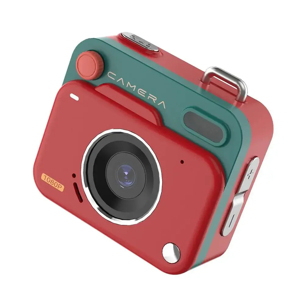 Red and teal plastic digital camera with 1080p lens, side control buttons, and metal strap loop.